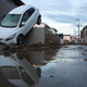 The floodwaters were so strong, they moved entire vehicles.